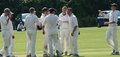 The Darwen players celebrate the fall of Javaid Hussain caught and bowled by Andrew Coo
