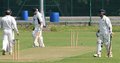 Joe Davies on his way after being bowled by Atif Ashraf