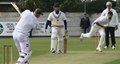 Adam Hornby attacks the ball from Zafir Patel