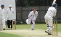 Adam Cowperthwaite bowling to Adam Taylor with Atiq Uz Zaman looking on
