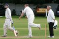 Graham Lee bowling his slow left arm