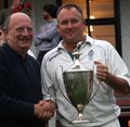 Chris Dovey receives the Division 2 Champions Trophy from Norman Poole