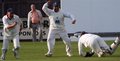 Duncan Whalley takes a diving catch to dismiss Lewis Bradley