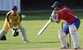 Atiq Uz Zaman plays down to third man with Luis Reece behind the stumps
